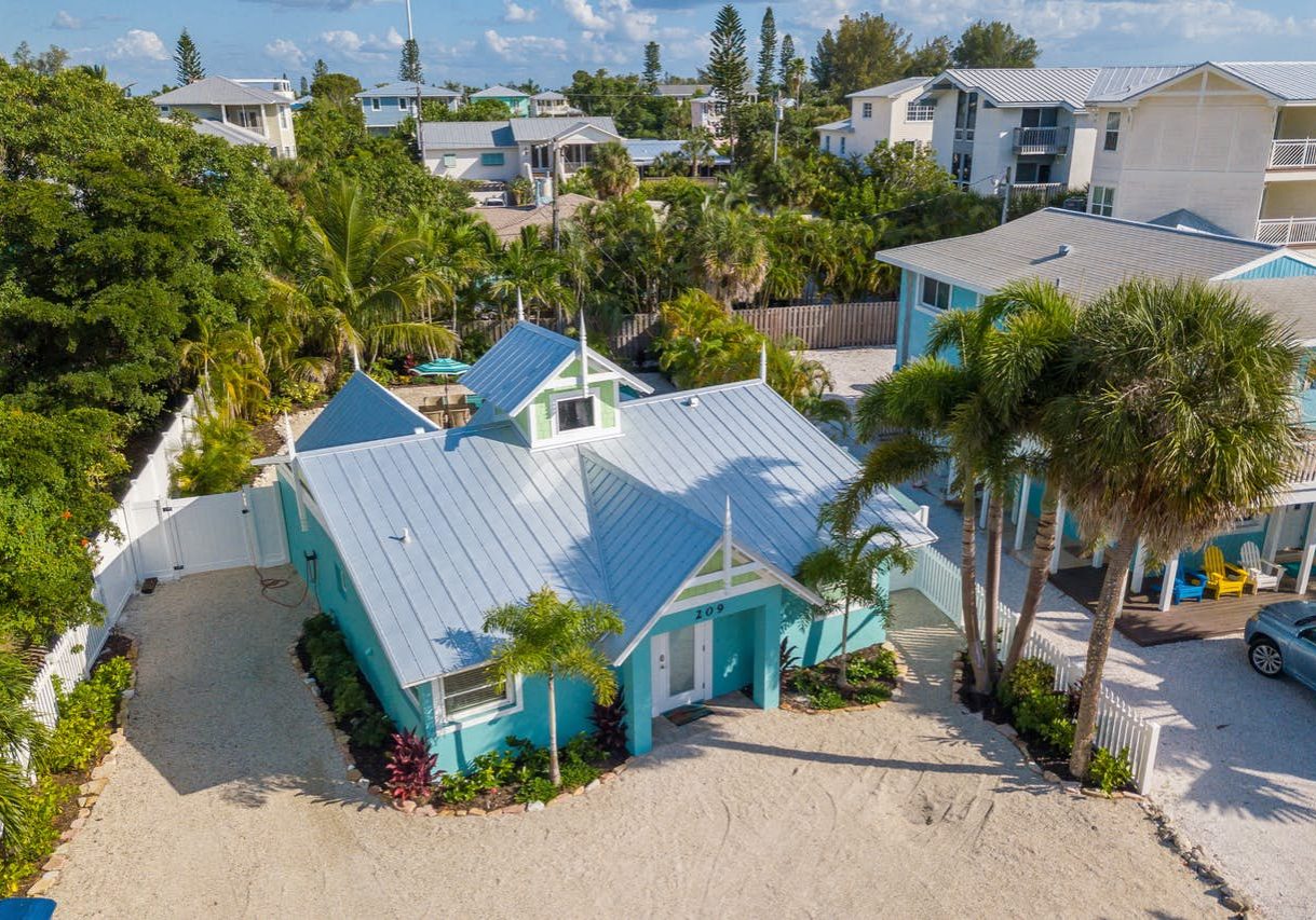 Waterfront property with dock and landscaping